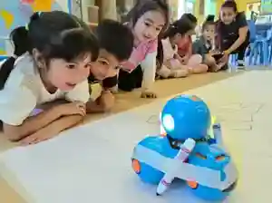 Children using tablets for interactive learning at Garden Grove Montessori